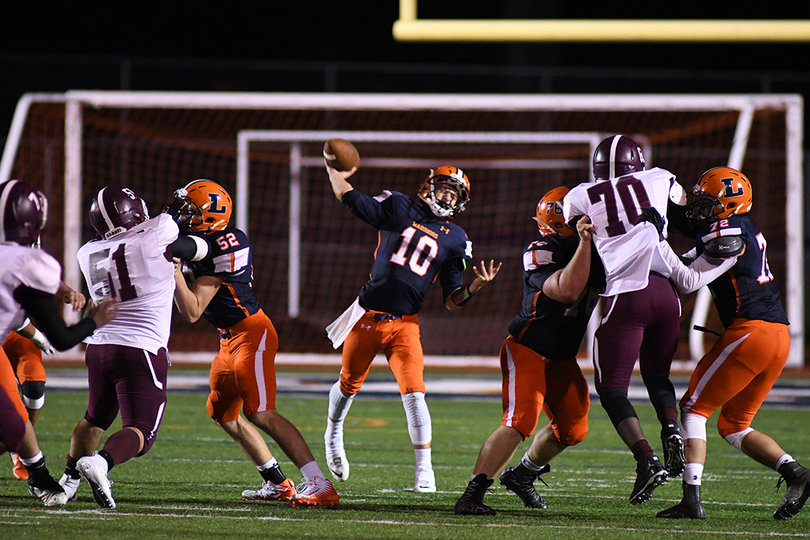 Alex Ruston throws a pass in the second half. He finished 8-for-12 through the air.