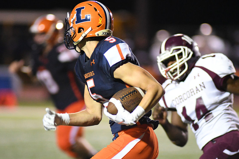 Liverpool's Kaleb Ohlemacher finds the edge on a punt return in the third quarter.