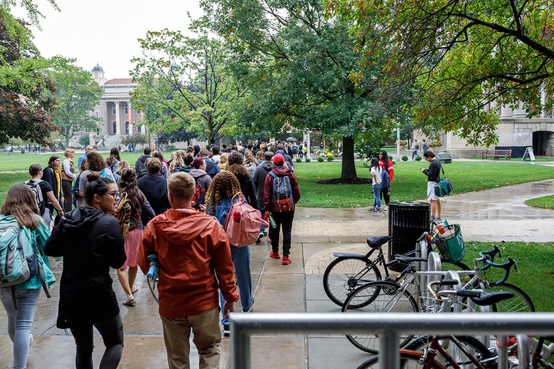 Demonstrators move from the Huntington Beard Crouse Hall to the steps in front of Hendricks Chapel for the protest of Brett Kavanaugh.
