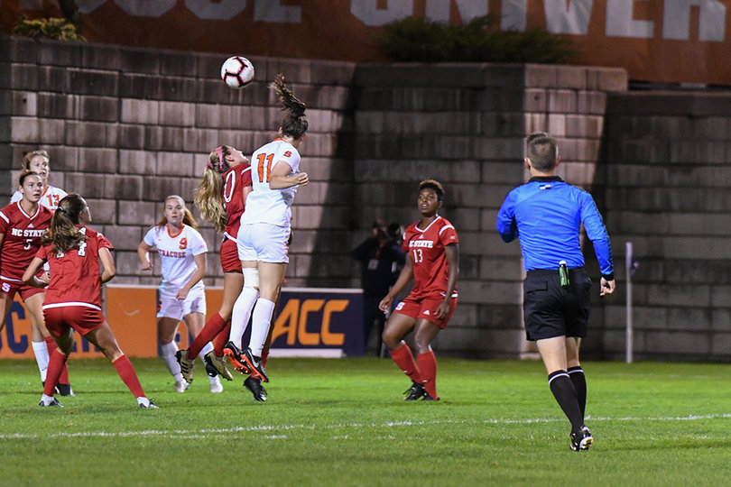 Tivnan heads the ball into the SU crease.
