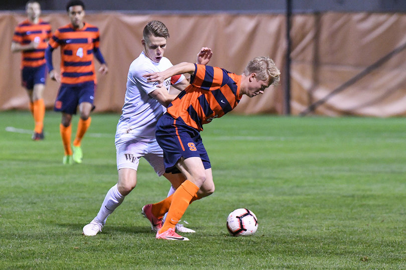 Severin Soerlie boxes out an WFU player. He didn't record a shot in SU's win.