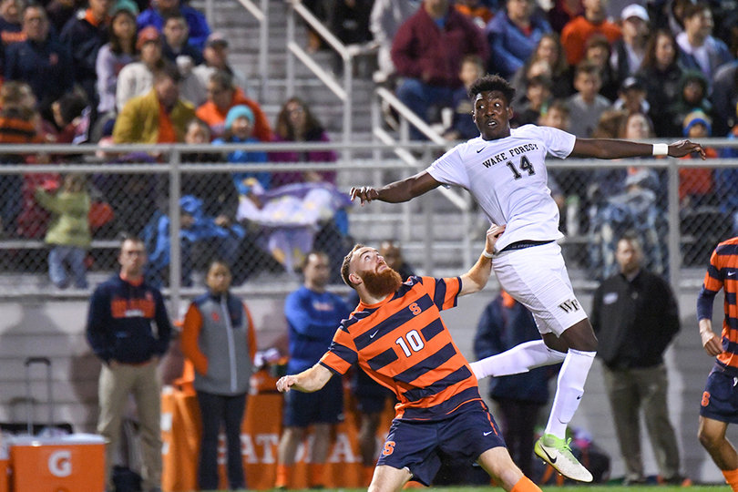 Delhommelle prepares to play the ball off his head.