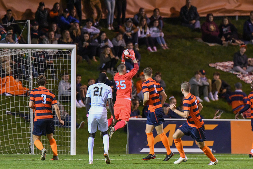 Hendrik Hilpert makes a save on a shot fired high. He had five including a game-saving stop in the 13th minute.