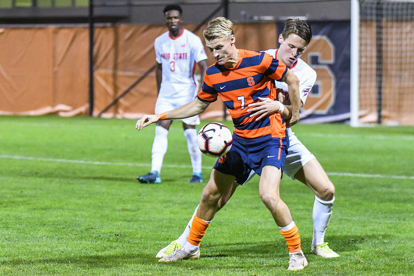 Soerlie boxes out a Buckeyes defender. He put two shots on goal in the game.