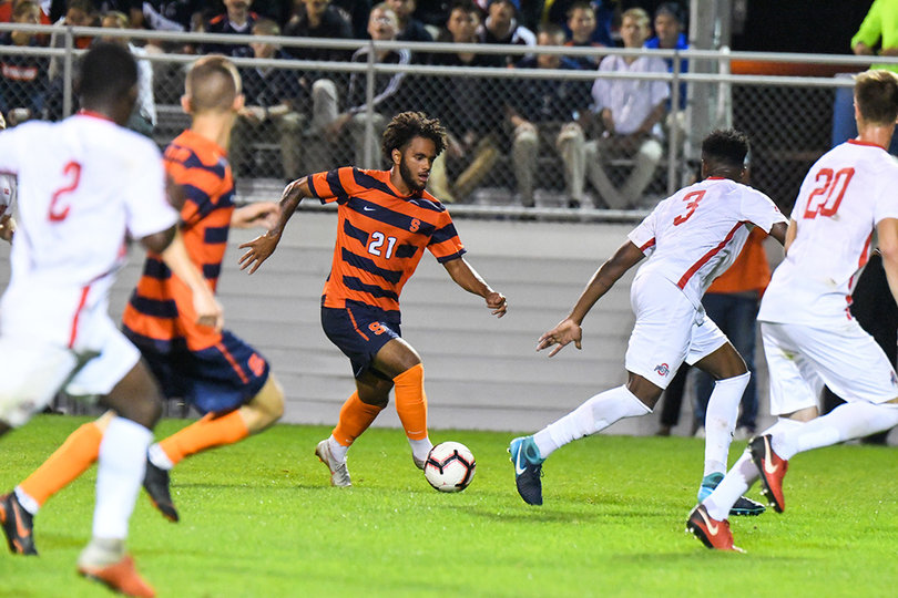 St. Louis dribbles the ball in the second half of the game.