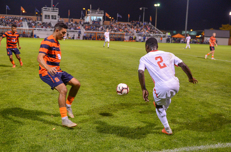 Ferrin converges on an Ohio State offensive player.