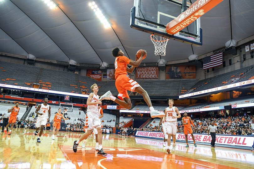 Freshman Robert Braswell skies toward the rim. Braswell is a 6-foot-9 forward.