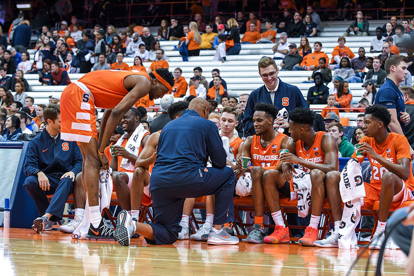 Adrian Autry coaches the Orange team during the scrimmage.