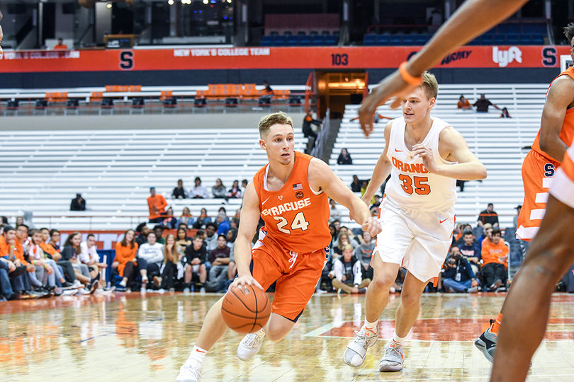 Shaun Belbey drives right. Belbey is a senior walk-on for Syracuse.