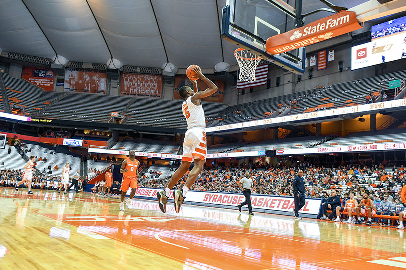 Carey, the guard from New Jersey, goes up toward the rim.