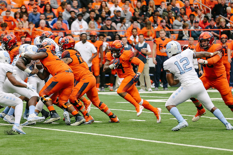 Donte Strickland bursts towards the line of scrimmage. He had 27 rushing yards.