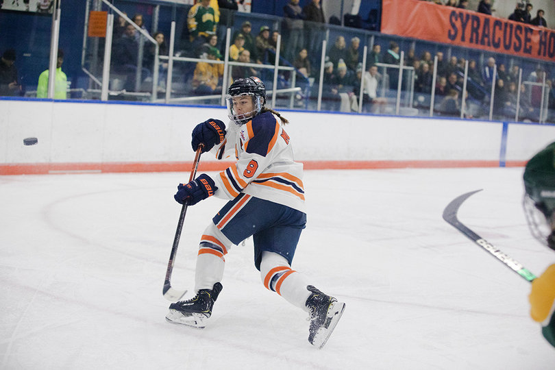 With the game clock winding down, Syracuse fights to keep the puck on their opponents side of the ice by tossing it up in the air. 