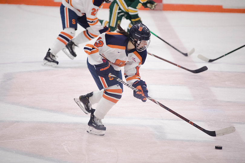 Abby Moloughney races up the ice with the puck. 