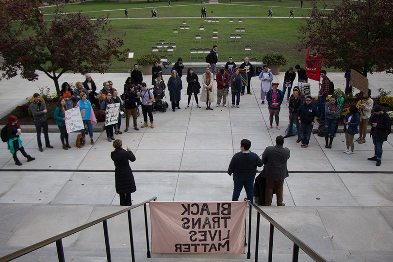 Students, faculty and staff members gather at the steps of Hendricks Chapel for more than an hour as part of the "Speak Out for Trans Life" rally.