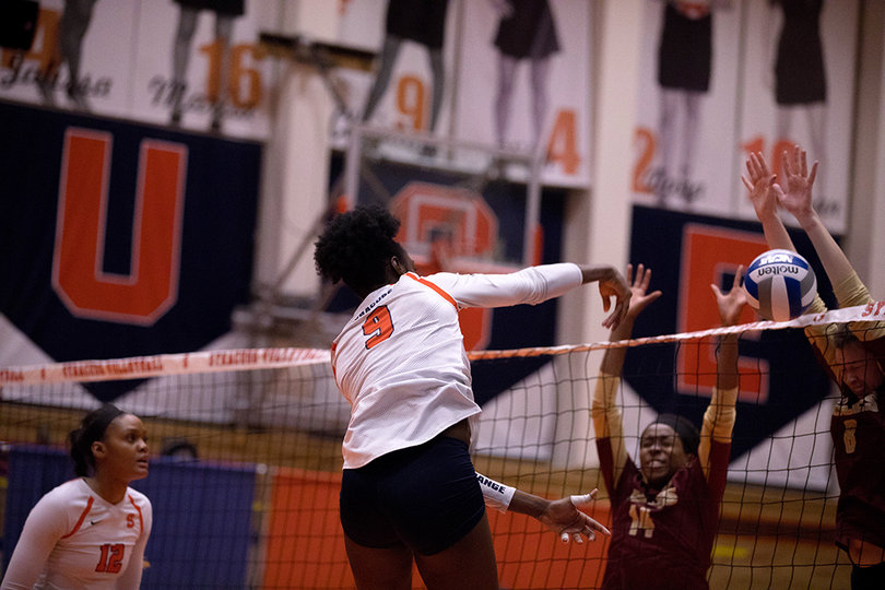 Christina Oyawale spikes a ball for a Syracuse point. 