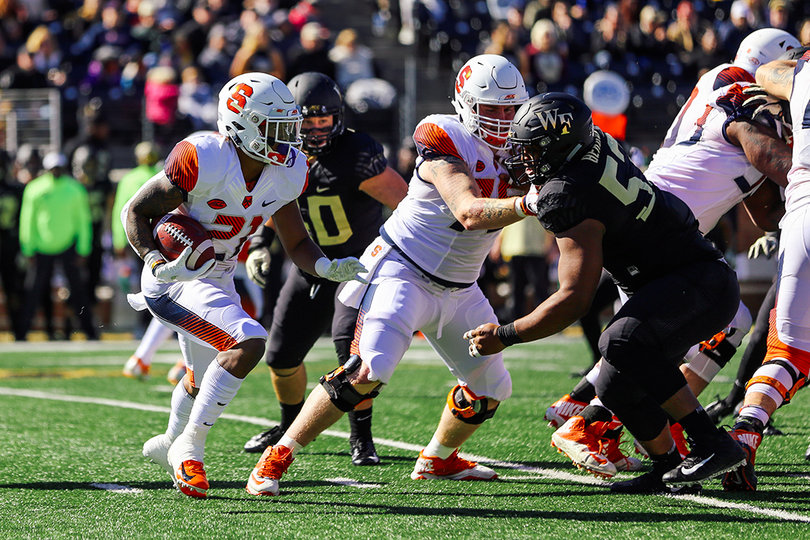 Moe Neal ran for 67 yards as part of SU's strong rushing attack.
