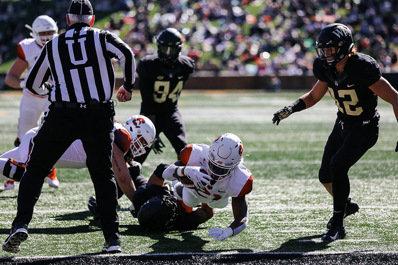 Neal's work included a touchdown where he just broke the plane of the end zone.
