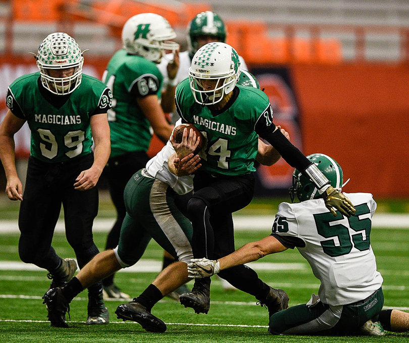 Herkimer's James Aiello runs the ball downfield. 