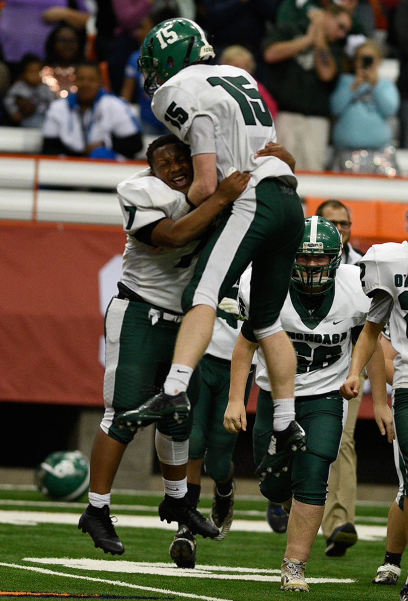 Onondaga's King Owens (No.7) and Wes Corr (No.15) celebrate their win. 
