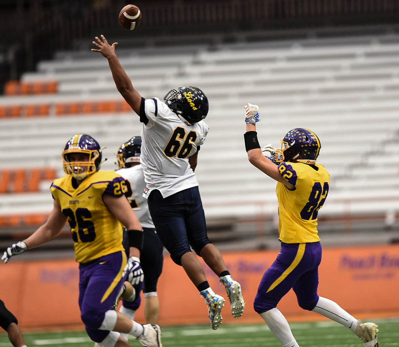 Herringshaw connected with Jeff Sobel (82) on five passes, but not on this play as it was deflected.