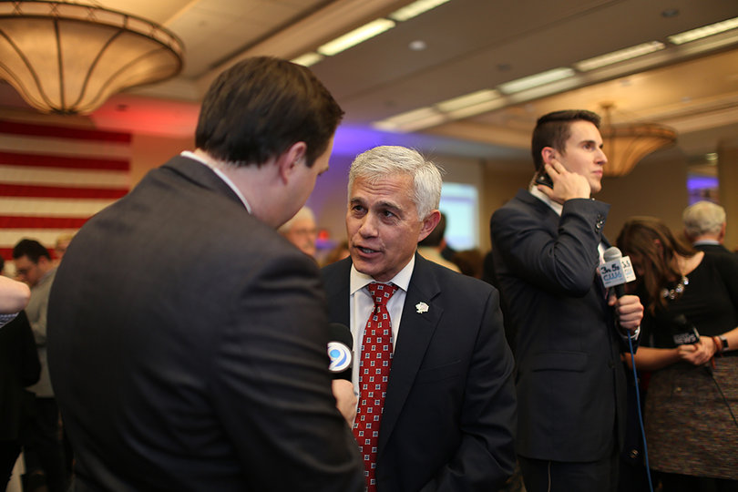 Robert Antonacci chats with a reporter at Tuesday's Republican watch party. 