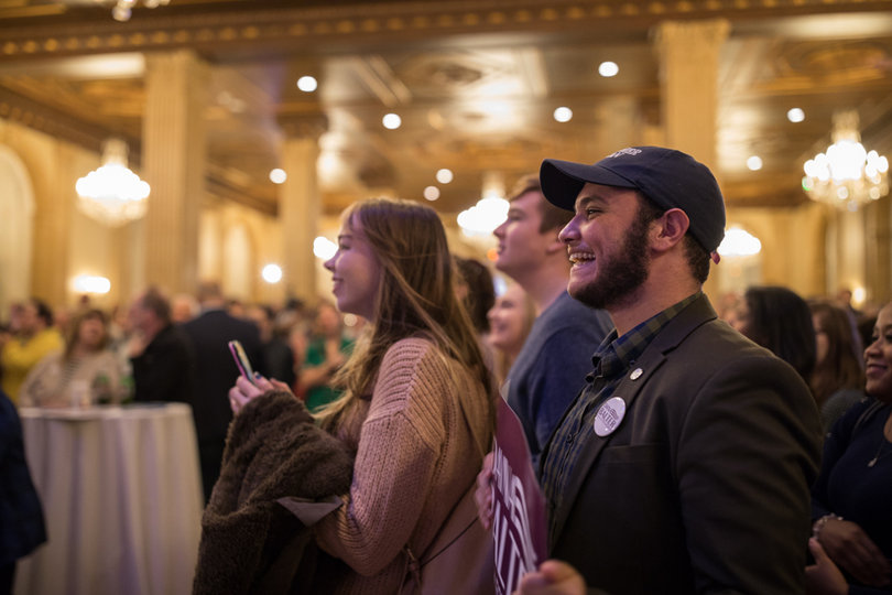 SUNY Oswego student and Dana Balter supporter Omar Van Reenen cheers as early predictions show Anthony Brindisi with a wide lead against New York's 22nd District incumbent Rep. Claudia Tenney (R-New Hartford).