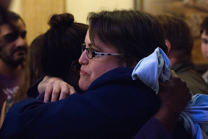 Dana Balter hugs a supporter at the Democratic watch party on Tuesday night. 