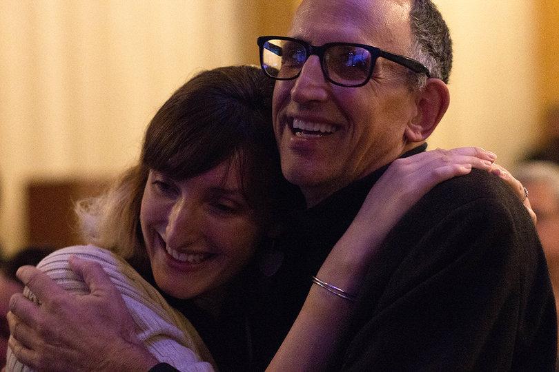 Rachel May's husband and daughter celebrate after her victory.