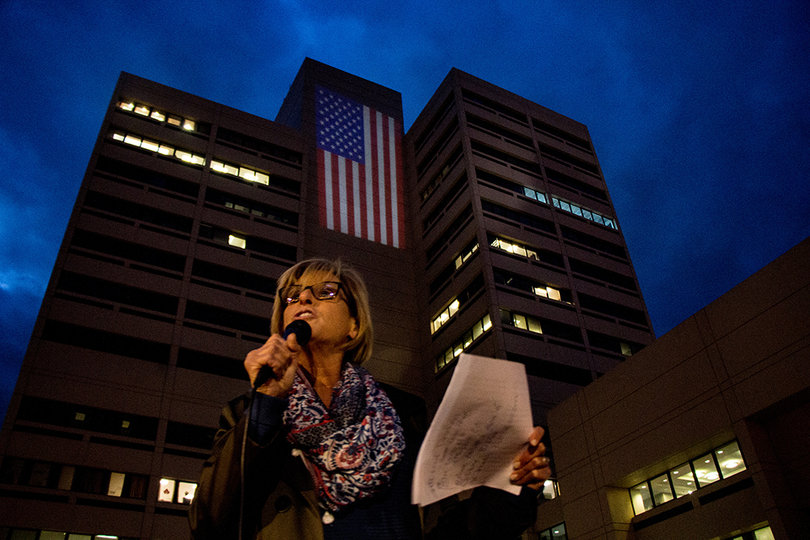 Donna Oppedisano speaks to the crowd at the rally.