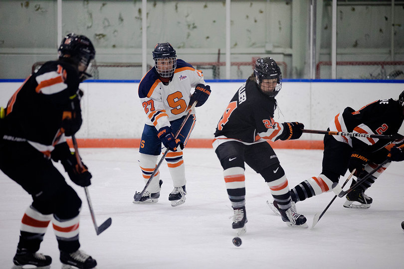 Victoria Klimek (#27) passed the puck to an open teammate. 