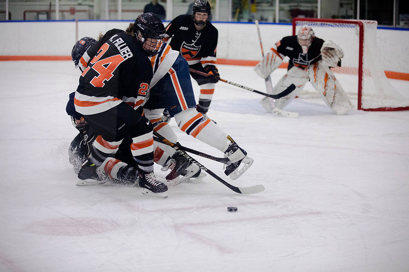 One player tripping resulted in a pile up on the ice, as players scrambled for the puck. 
