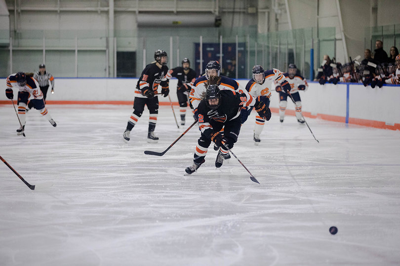Chasing a Princeton player down, Syracuse caught up and prevented a goal. 