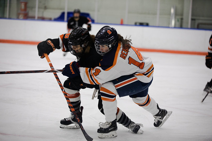 Savannah Rennie (#14) made a good defensive move against the Princeton player that pushed forward. 