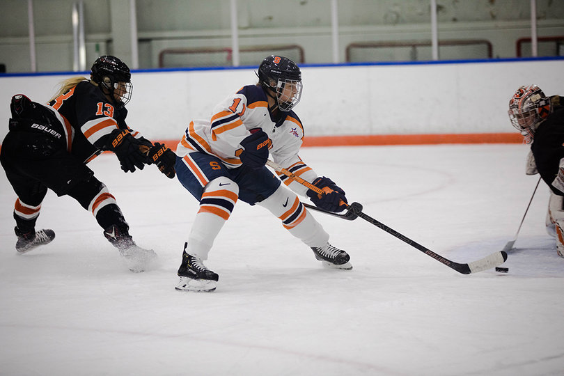 Kelli Rowswell (#11) forced the puck toward the goal more than once this game. 