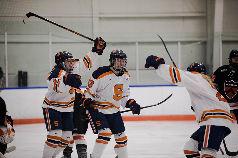 The Orange celebrate after one of their shots were made
