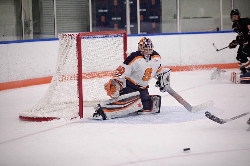 Maddi Welch allowed four goals on 18 shots, and the Orange allowed a late empty-net goal.