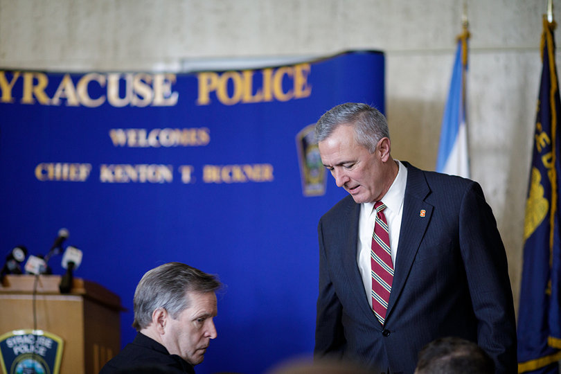 Congressman John Katko (R-Camillus) takes a seat next to Onondaga County Sheriff Gene Conway before the ceremony begins.