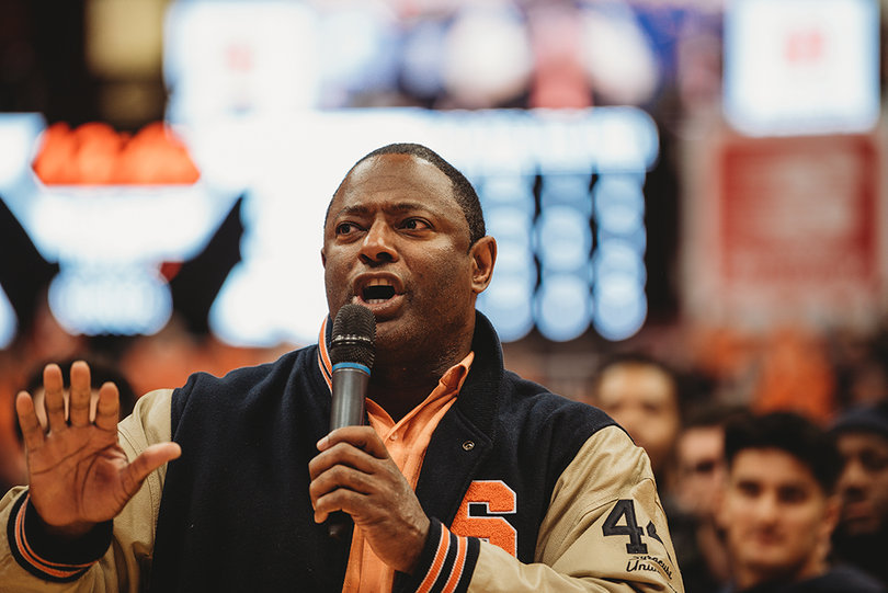 Syracuse football head coach Dino Babers and the Orange football team were honored at halftime. Babers urged the crowd to support the team by attending the Camping World Bowl game in Orlando, Florida on Dec. 28. 