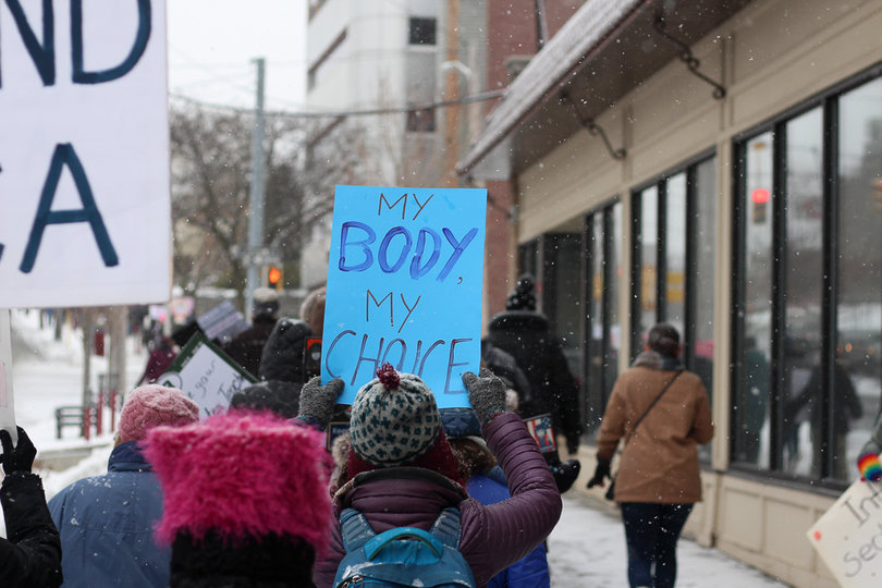 People carried signs with feminist messages regarding gender, privilege and education, among other areas of social justice.