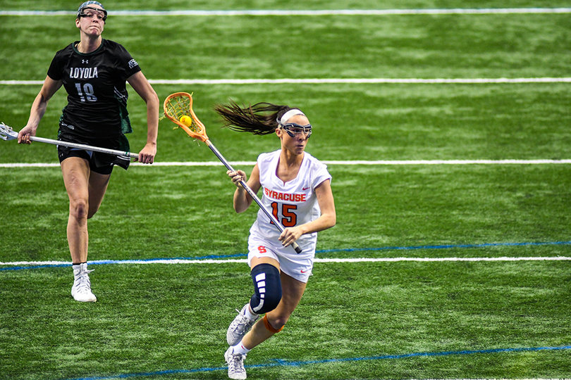 Wallon beats her defender to set up a play which would result in a goal for SU.