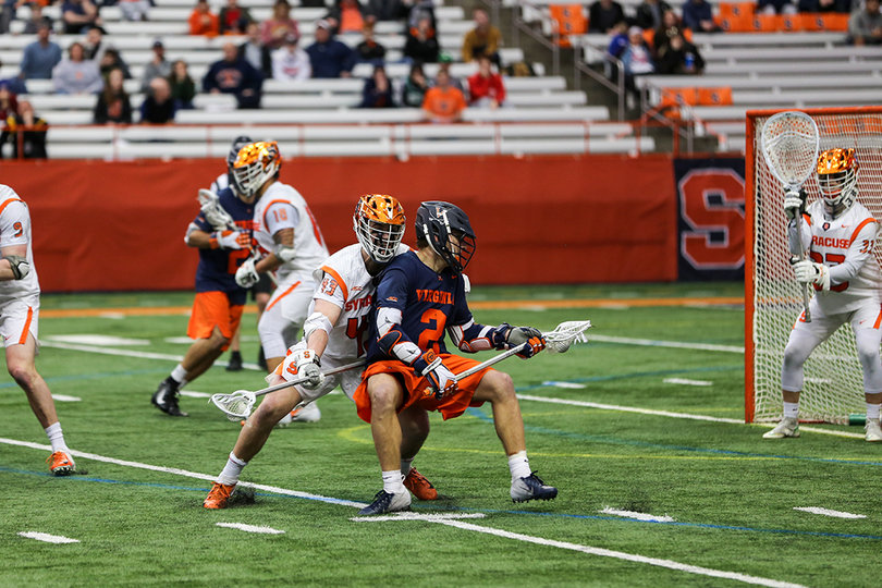 Marcus Cunningham stopping UVA's Michael Kraus inside. 