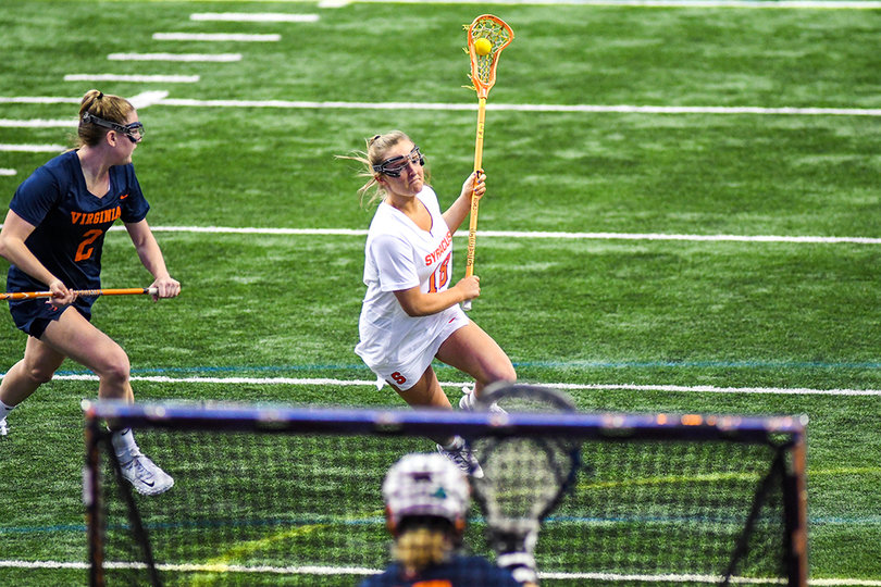 Meghan Tyrrell drives the net.