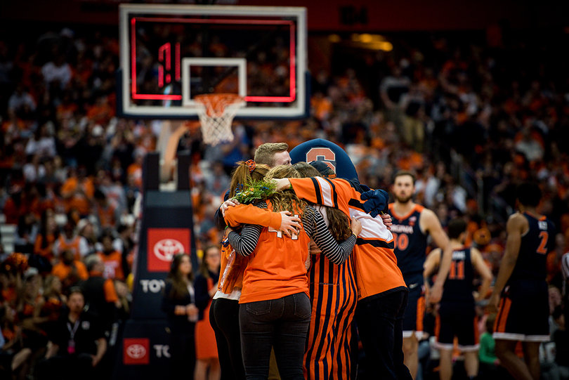 The SU students who are “Otto,” the team mascot, were revealed Monday in the first half. 