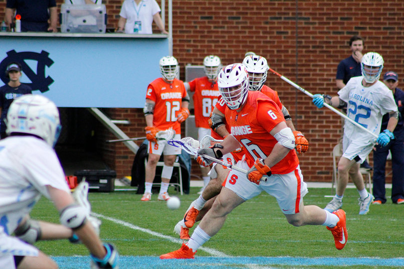 Luke Schwasnick runs the ball up the field