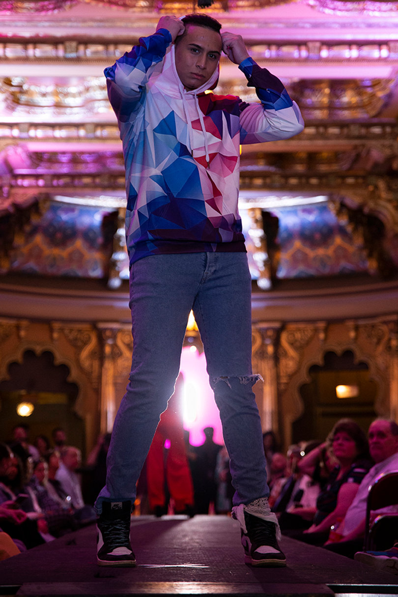 This hoodie, by Alexis Reed, featured geometric shapes that matched the ceiling of the Landmark Theatre.
