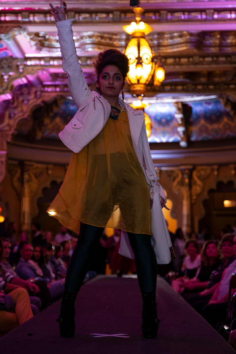 A model hits a pose before turning. 