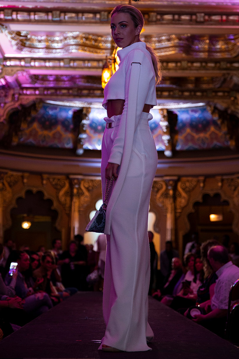 The clothing created by Glow, a trampoline park business based in Destiny USA, were all-white designs. 