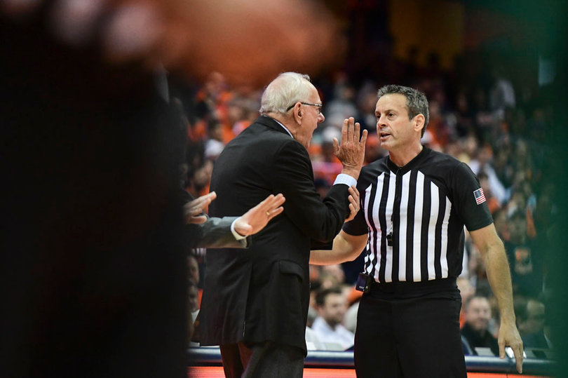 Jim Boeheim argues with an official
