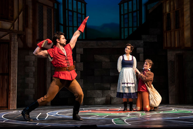 Steve Czarnecki (left) poses as Gaston for Stephanie Craven, who plays Belle, and Ethan Carlson who plays Gaston's sidekick Lefou.