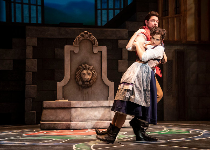 Steve Czarnecki who plays Gaston pulls Stephanie Craven as Belle, across the stage. 